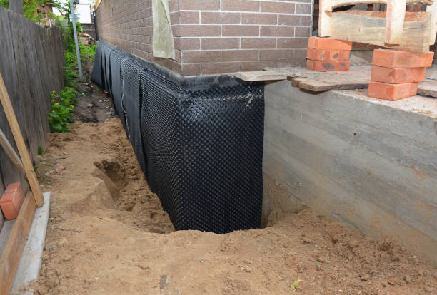 Happy homeowners after waterproofing job in Barberton